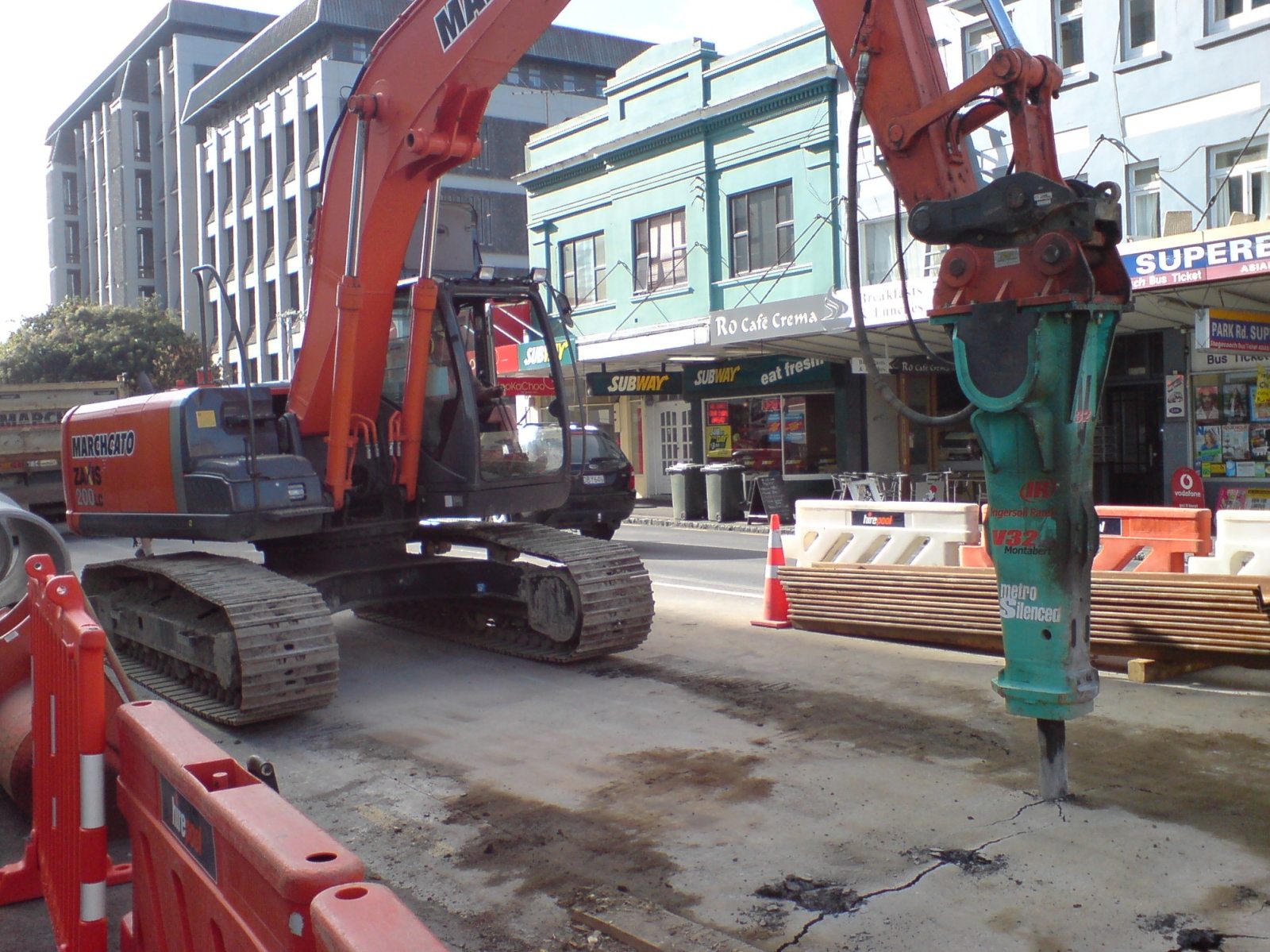 Will a bucket handle hard ground, or do you need a hydraulic breaker?