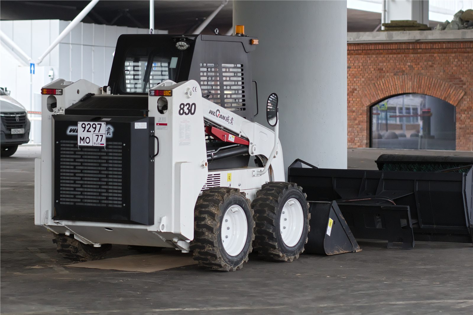 Skid steer or mini excavator for landscaping and site cleanup?